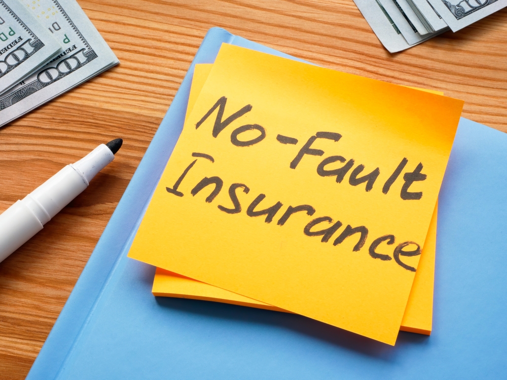 A,Sticker,With,Memo,No,Fault,Insurance,And,Notepad.